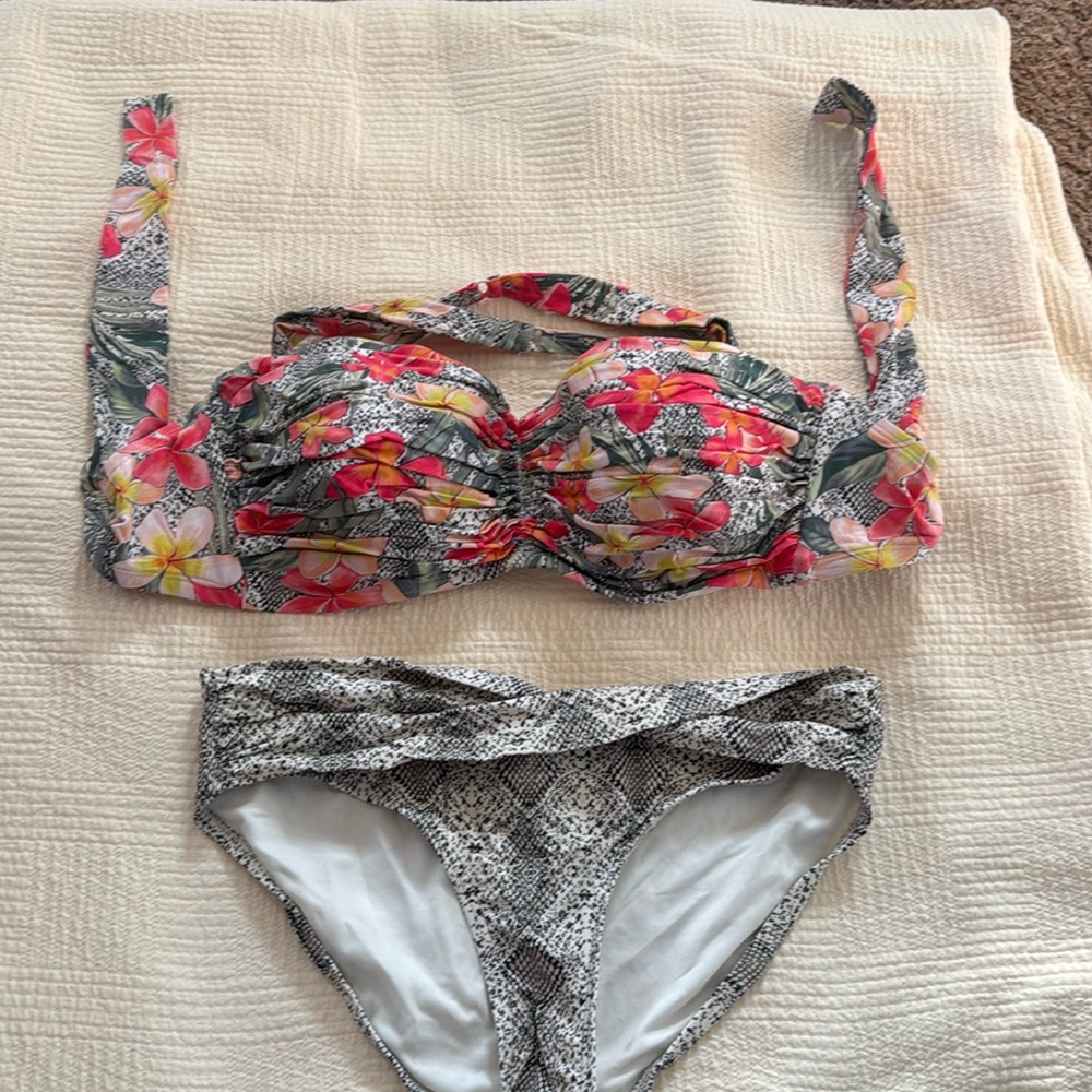 Bra size top bikini.  Snake print with floral details on the top.
